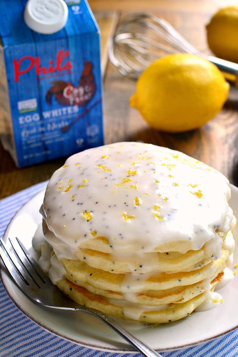 These Lemon Poppy Seed Pancakes are light, fluffy, and bursting with lemon flavor! Try them with lemon poppy seed glaze for a sweet, tart, delicious start to your day.