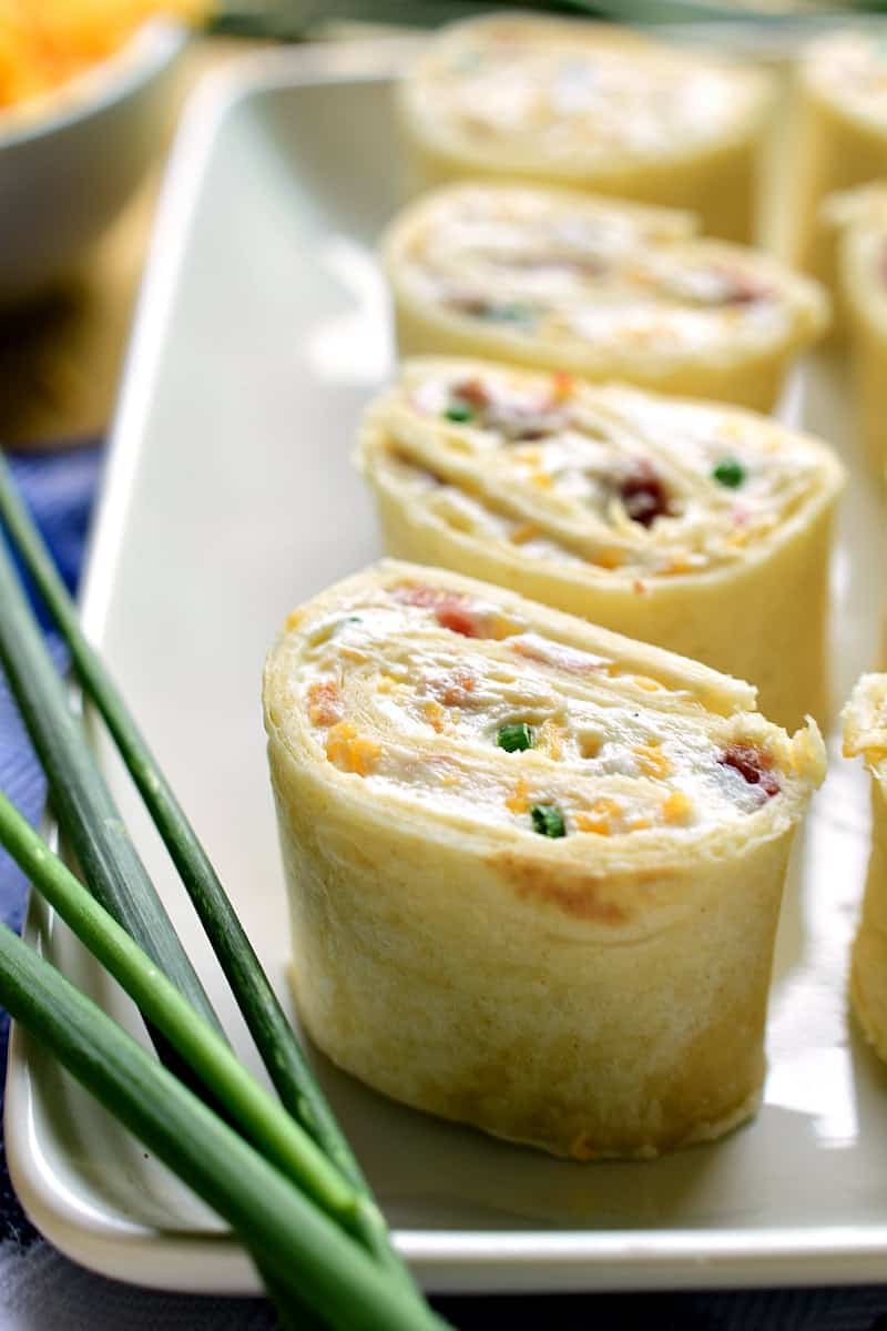 Bacon Cheddar Ranch Pinwheels 5These Bacon Cheddar Ranch Pinwheels are the perfect party food! Loaded with bacon, cheddar cheese, and creamy ranch flavor, they're sure to become everyone's new favorite!