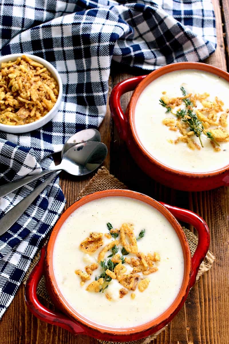 This Cheesy Cauliflower Soup is creamy, comforting, and packed with delicious flavor! Perfect for busy weeknights or lazy weekends at home....and you won't believe how easy it is to make!