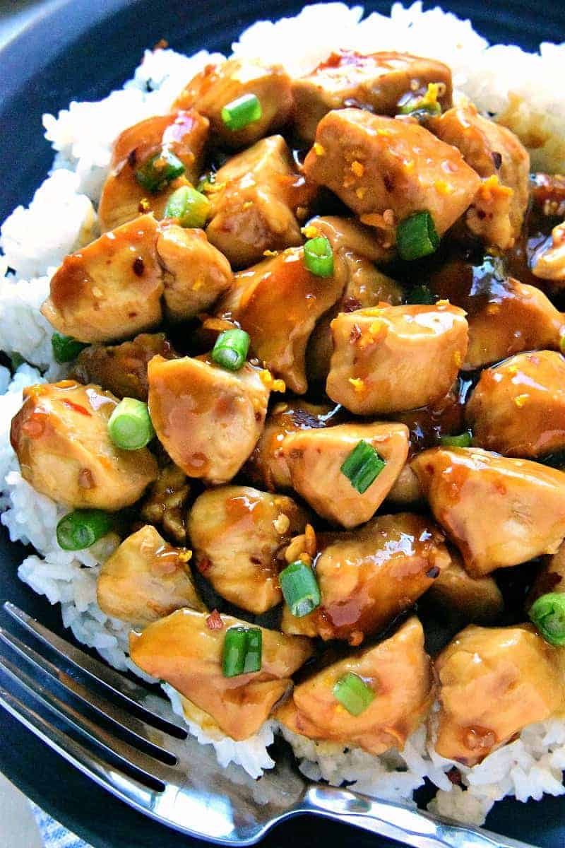 Skinny Orange Chicken - a delicious, lightened up version of your favorite takeout! This recipe comes together in 30 minutes or less and is guaranteed to satisfy the whole family!