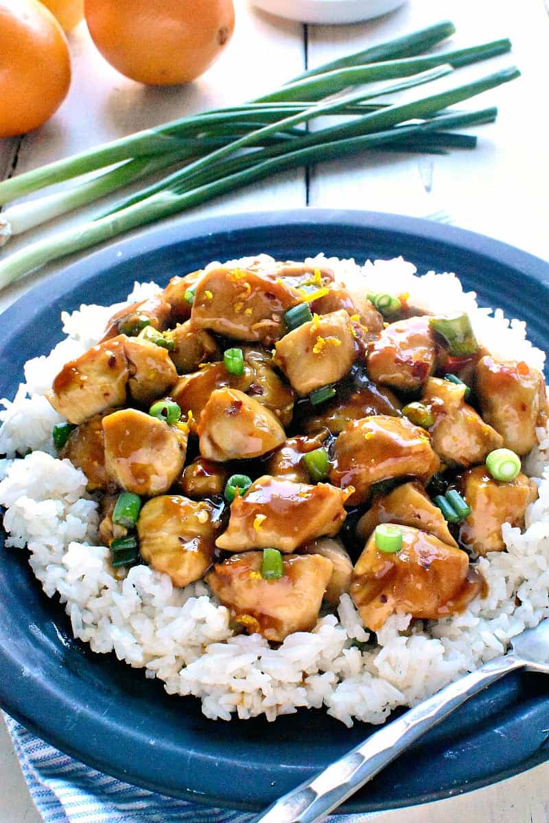 Skinny Orange Chicken - a delicious, lightened up version of your favorite takeout! This recipe comes together in 30 minutes or less and is guaranteed to satisfy the whole family!