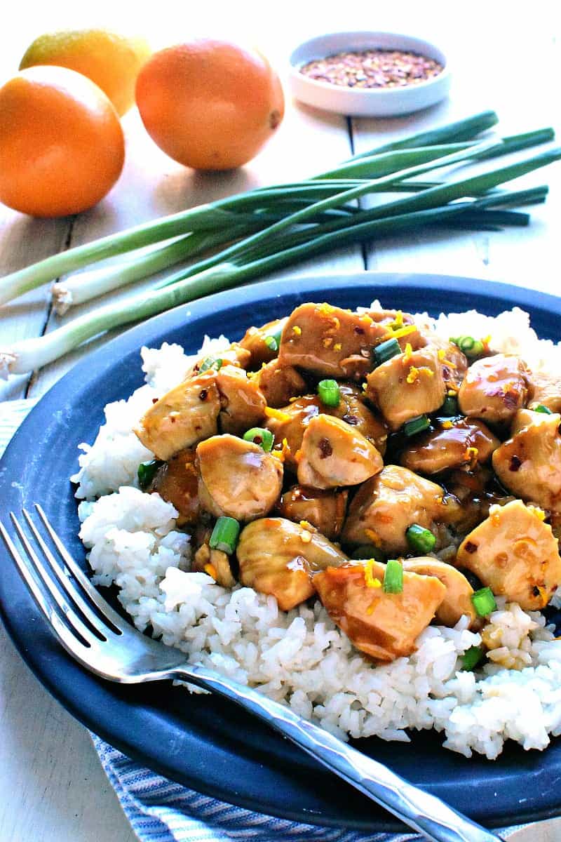 Skinny Orange Chicken - a delicious, lightened up version of your favorite takeout! This recipe comes together in 30 minutes or less and is guaranteed to satisfy the whole family!