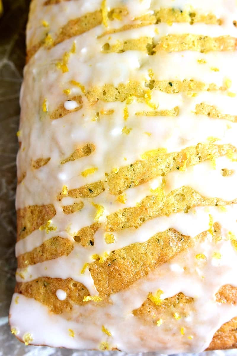 This Lemon Zucchini Bread combines two favorites in one delicious loaf of bread! Topped with a sweet lemony glaze, it's a great way to sneak in extra veggies and the BEST way to wake up!