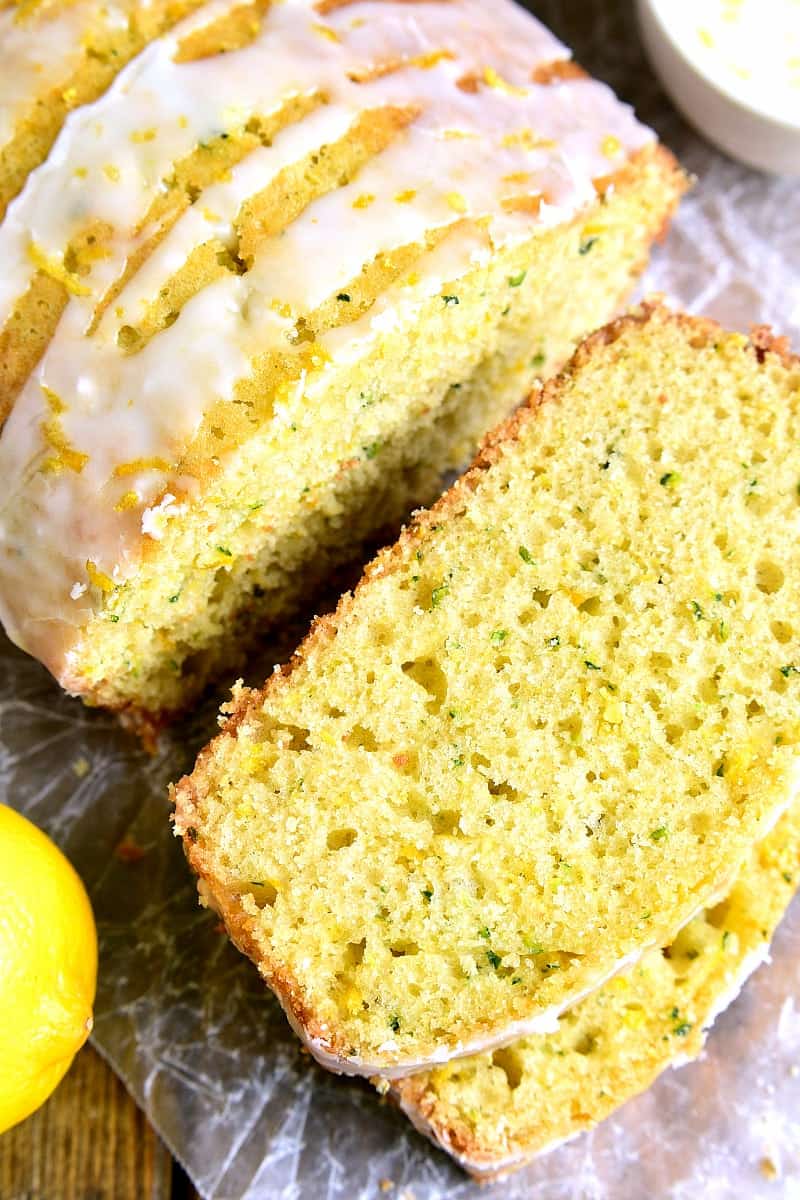 This Lemon Zucchini Bread combines two favorites in one delicious loaf of bread! Topped with a sweet lemony glaze, it's a great way to sneak in extra veggies and the BEST way to wake up!