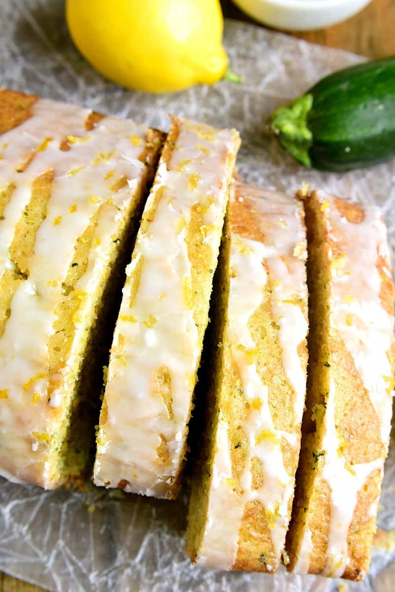 This Lemon Zucchini Bread combines two favorites in one delicious loaf of bread! Topped with a sweet lemony glaze, it's a great way to sneak in extra veggies and the BEST way to wake up!