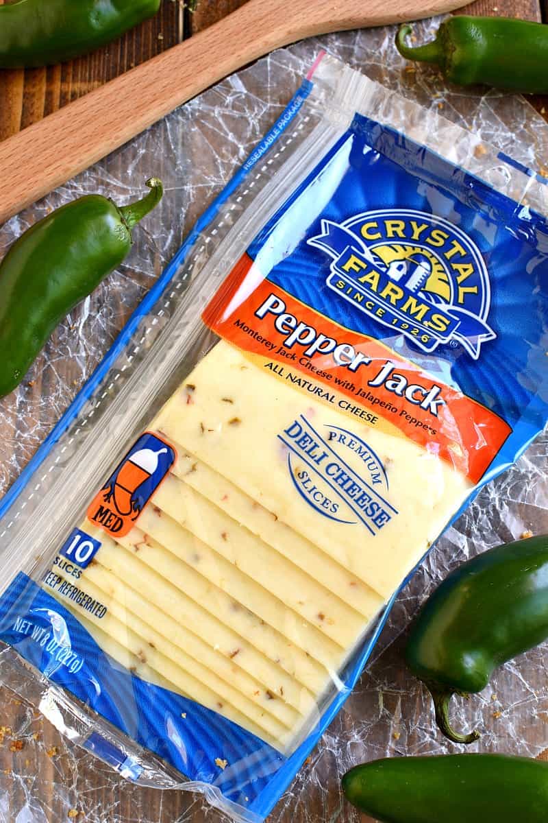 This Jalapeño Popper Grilled Cheese is EVERYTHING!! Gooey, spicy, cheesy, and SO delicious. If you love jalapeño poppers you'll go crazy for this awesome sandwich!