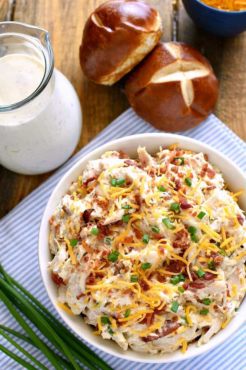 This Bacon Cheddar Ranch Chicken Salad is packed with all the BEST flavors! Chicken, bacon, cheddar, cheese, and ranch dressing come together in the most delicious way in this chicken salad that's guaranteed to become a favorite!