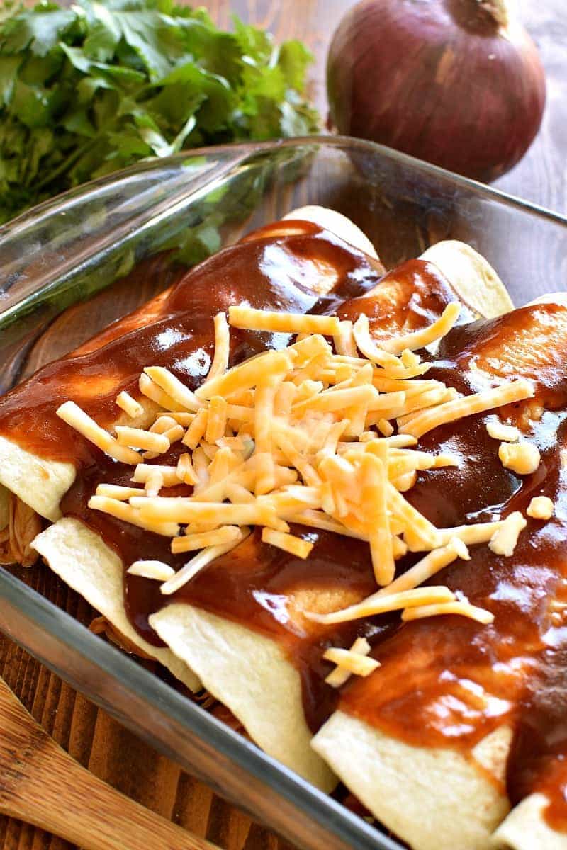 These BBQ Chicken Enchiladas are EVERYTHING!! Loaded with rotisserie chicken, bacon, barbecue sauce, and gooey cheese, they're packed with delicious flavor and sure to become a new family favorite!