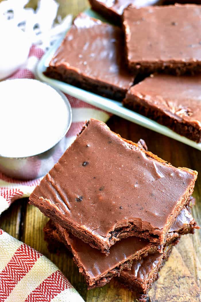 Stack of frosted brownies 