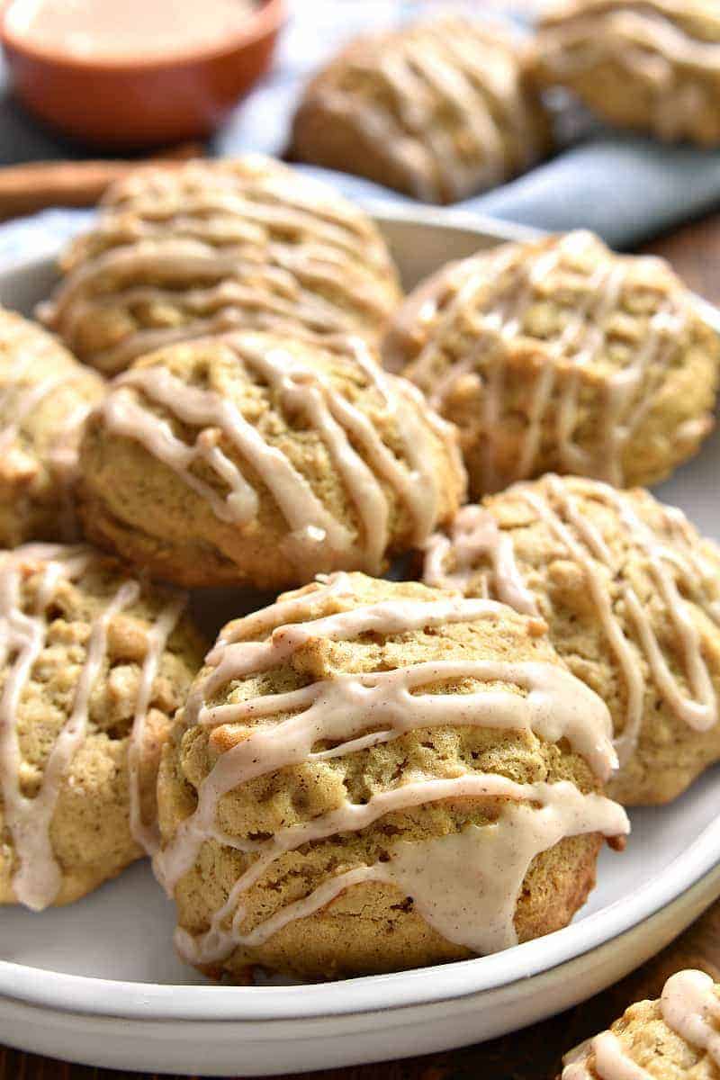 These Oatmeal Breakfast Cookies are packed with flavor and perfect for busy mornings! Topped with a sweet cinnamon glaze, they're every kid's dream....and just in time for back to school!