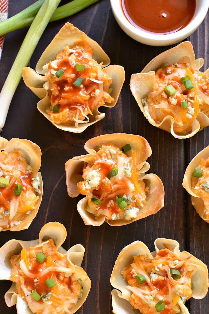 These Buffalo Chicken Wonton Cups are the PERFECT little bites! Loaded with all the classic flavors of buffalo chicken, they're crunchy, creamy, spicy, and SO delicious....perfect for game day, parties, or just because!