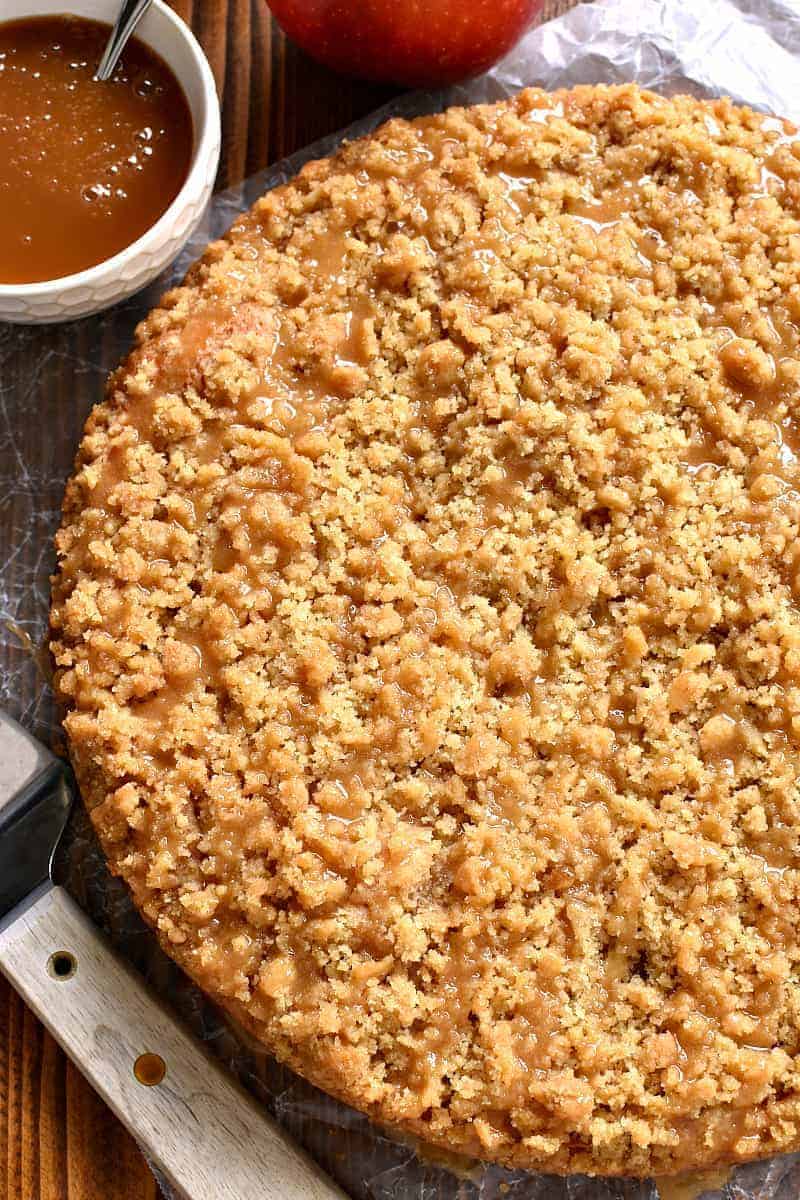 This Caramel Apple Coffee Cake is the ultimate taste of fall! Loaded with fresh apples and topped with gooey caramel, this is one breakfast treat your family will ask for again and again!