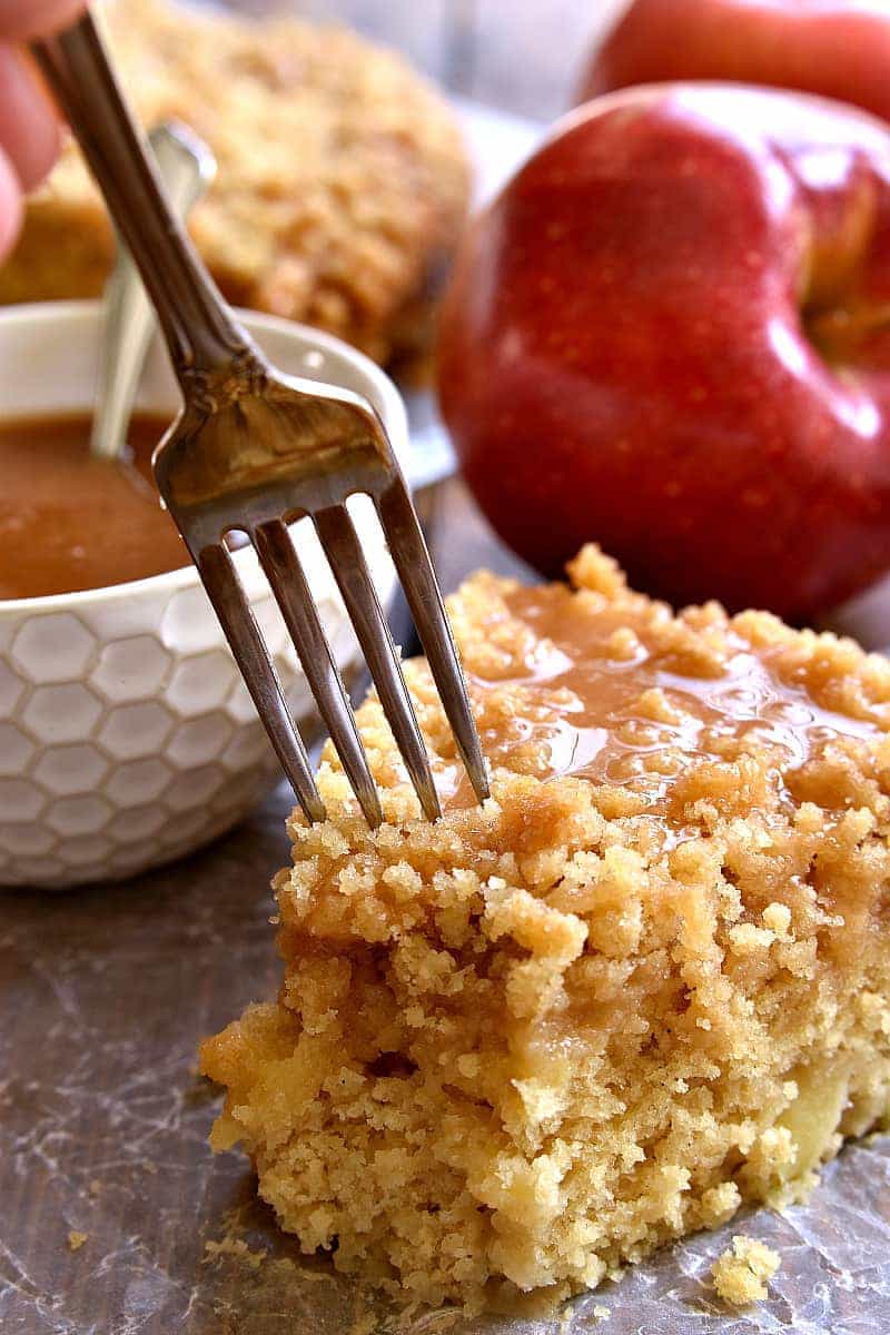 This Caramel Apple Coffee Cake is the ultimate taste of fall! Loaded with fresh apples and topped with gooey caramel, this is one breakfast treat your family will ask for again and again!