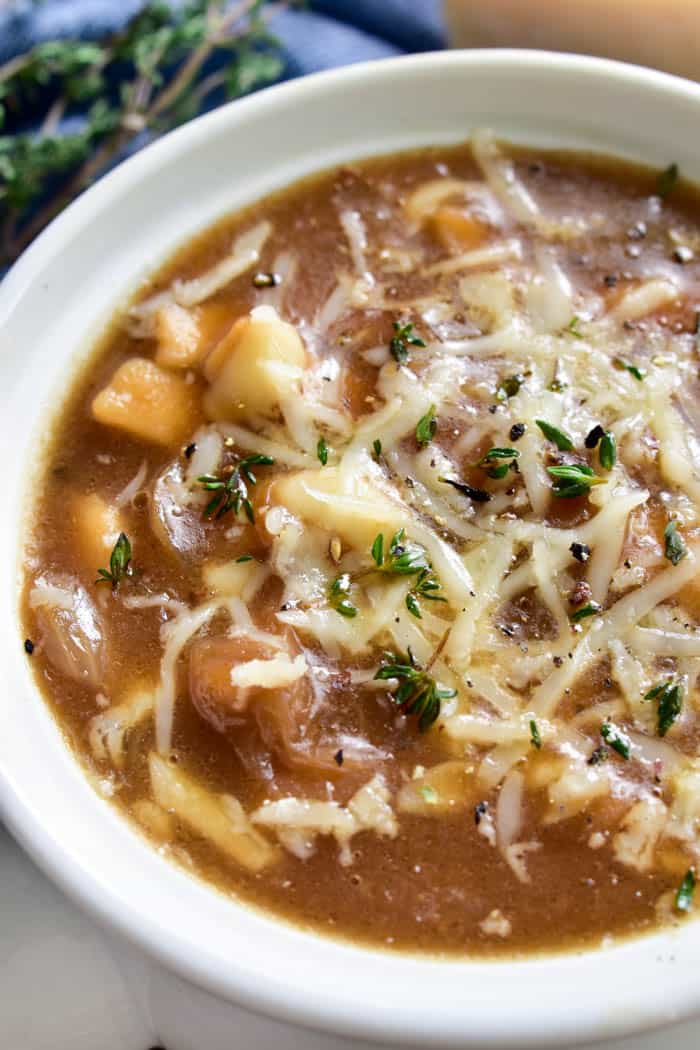 Take your love of soup to the next level with this delicious French Onion Noodle Soup. All the flavors of the classic French Onion Soup, with the added bonus of noodles! This soup is thick, hearty, and packed with flavor. It makes a great weeknight dinner and is also perfect for serving to guests or cozying up to on a lazy fall weekend. If you love French Onion Soup, you're going to fall in love with this comforting, delicious twist!