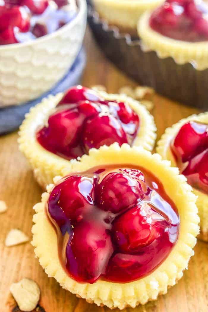 If you love cheesecake, you'll adore these Mini Amaretto Cherry Cheesecakes! The perfect easy dessert for holidays, parties, baby showers, or any special occasion. 