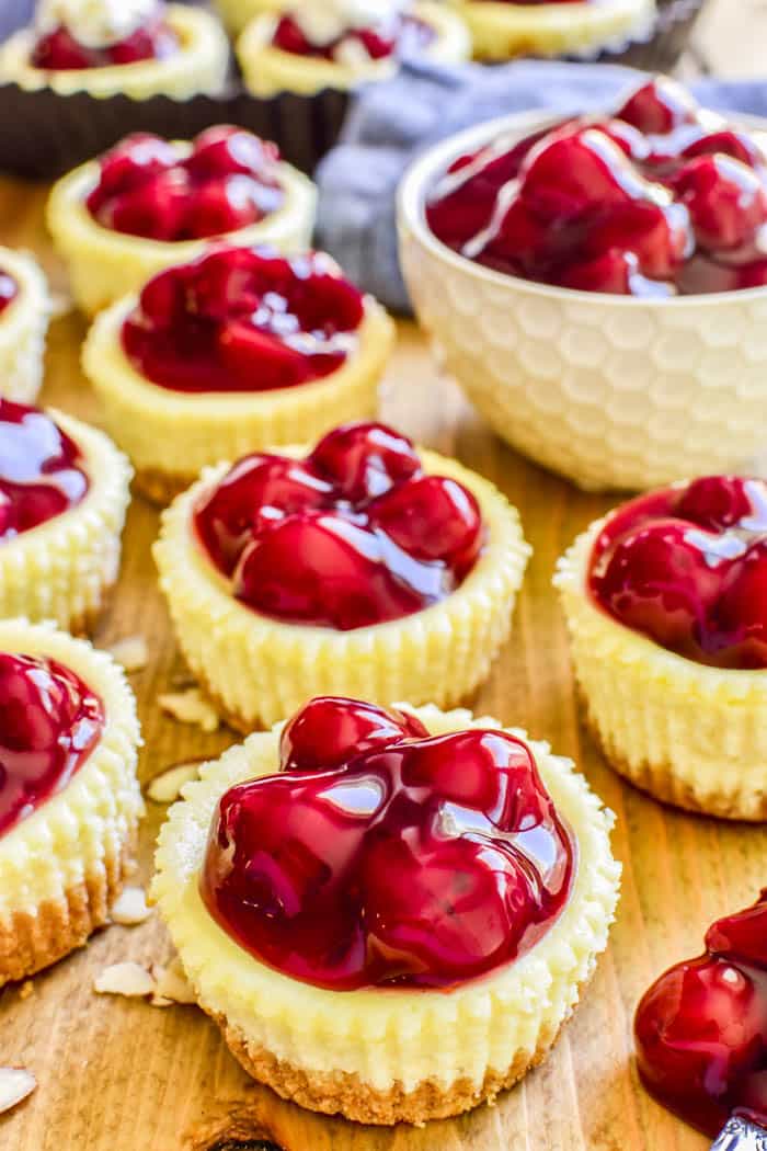 If you love cheesecake, you'll adore these Mini Amaretto Cherry Cheesecakes! The perfect easy dessert for holidays, parties, baby showers, or any special occasion. 