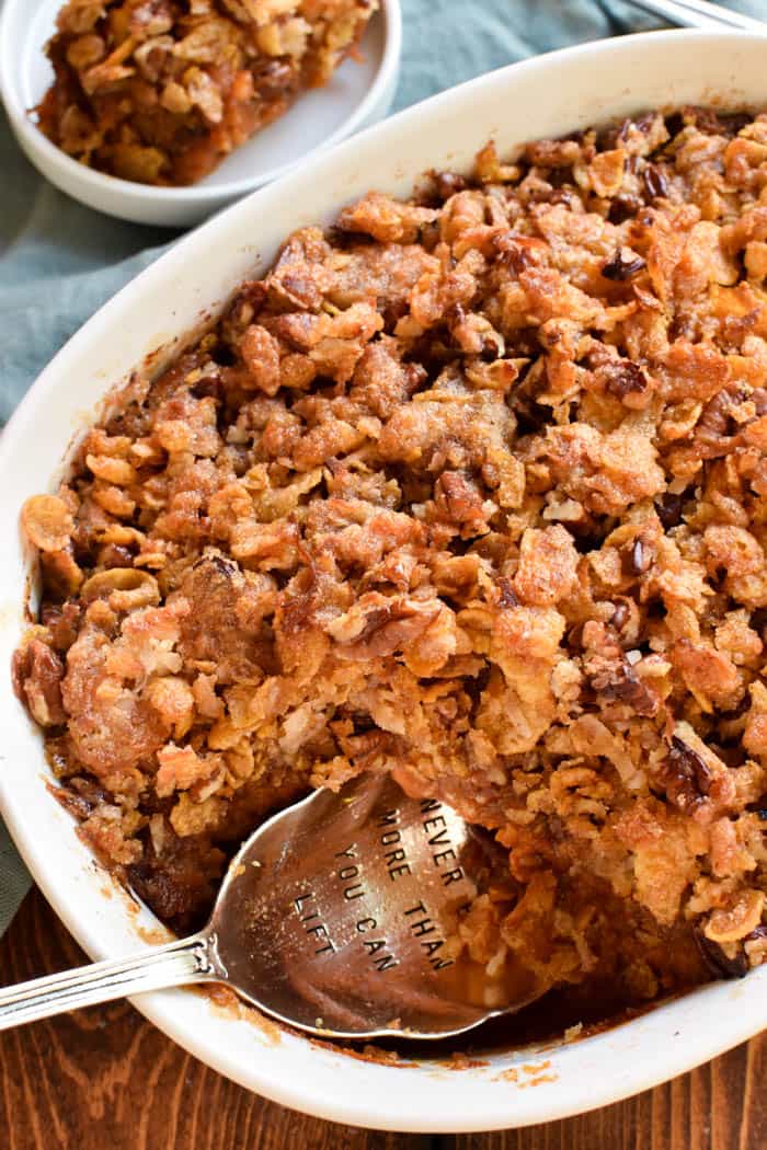 The ULTIMATE Sweet Potato Casserole! Loaded with fresh sweet potatoes, brown sugar, pumpkin pie spice, chopped pecans, and  a special secret ingredient, this casserole is crunchy, creamy, sweet, and so delicious. Perfect for all your holiday celebrations and easy to make in advance, so it's celebration-ready when you are. Whether you're a long time sweet potato lover or new to the game, you're going to fall in love with this recipe. It has the most amazing flavor and the BEST brown sugar pecan topping. Sure to become a new holiday favorite!
