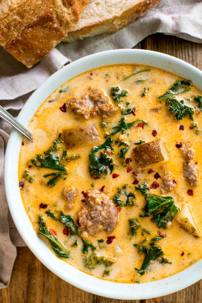 This Tuscan Sausage Potato Soup is perfect for warming up to on a cold day! It's made with just a handful of ingredients and packed with the most delicious flavor! Best of all, it comes together easily in ONE POT...making it ideal for busy weeknights and equally amazing for a lazy Sunday dinner. If you love Italian flavors and like things a little spicy, this Tuscan Sausage Potato Soup is for YOU!