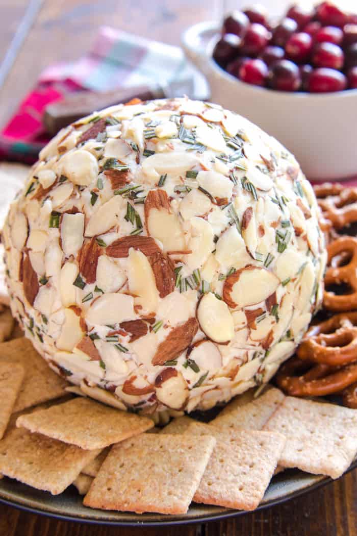 This Swiss Almond Cheeseball makes the PERFECT holiday appetizer! Because no holiday celebration is complete without a cheeseball....(am I right?)....and this Swiss Almond combo is to die for! If you've never tried it, now is the perfect time to try it and fall in love. All you need is a handful of ingredients, a few minutes of mixing, and some time to chill....and you have yourself a new party appetizer that's guaranteed to become a fast favorite!