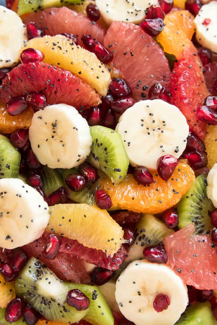 Take advantage of citrus season with this delicious Winter Fruit Salad! Loaded with all your favorite winter citrus fruits, plus bananas, kiwi, and pomegranate seeds, this salad is bright and sweet and guaranteed to help you beat the winter blues. And when you toss it in a sweet orange poppy seed simple syrup, the end result is a fruit salad you want to eat again and again, all winter long. Perfect for breakfast, lunch, or any meal in between, this salad is as healthy as it is delicious....and so pretty, too! Which makes it the ideal side dish for any special occasion. No matter how you slice it, this Winter Fruit Salad is guaranteed to become new favorite and sure to be the star of the show!