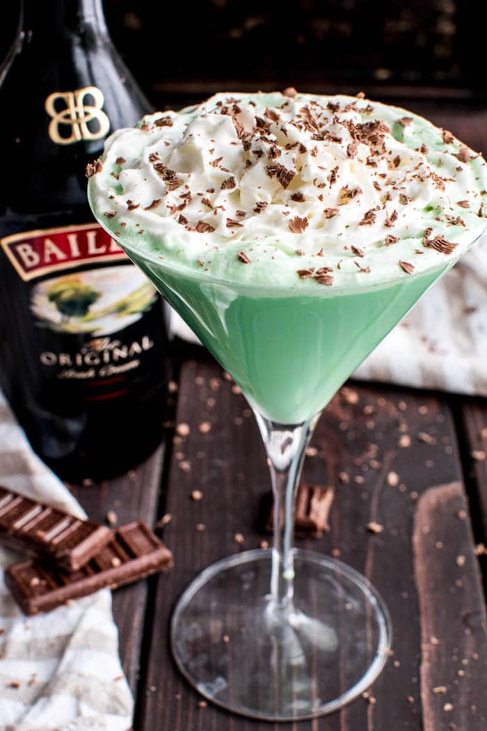 This Baileys Mint Martini is the ultimate combo! Creme de Menthe combined with Baileys Irish Cream in one delicious cocktail that's perfect for St. Patrick's Day, Christmas, or any special occasion. This minty martini not only tastes amazing, but also has the most vibrant green color, making it a fun and festive cocktail for all your holiday celebrations! If you love Baileys, you can't go wrong with this delicious Baileys Mint Martini....made with just 4 ingredients!