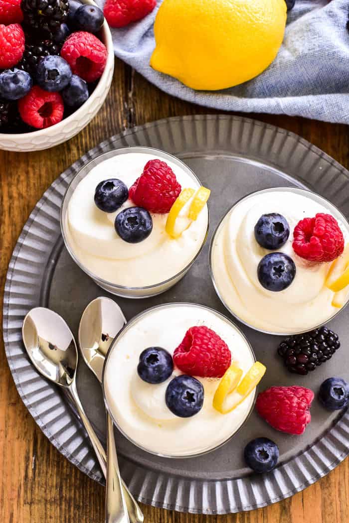 This easy Lemon Mousse is the perfect way to welcome spring! Light, fluffy mouse infused with the sweet flavor of lemon...this sweet treat is delicious all on its own or topped with fresh berries. Whether you're looking for a last minute Easter dessert or the perfect dessert for spring showers, this 5-ingredient Lemon Mousse is sure to be a hit!