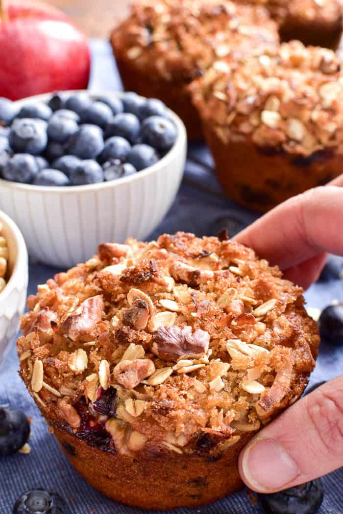 Apple Blueberry Muffins are a delicious grab and go option that's perfect for breakfast or an afternoon snack. These muffins combine two favorites in one yummy breakfast treat that's loaded with superfoods and topped with a sweet, crunchy topping. If you love blueberry muffins, you'll love this healthier option....perfect for the whole family!