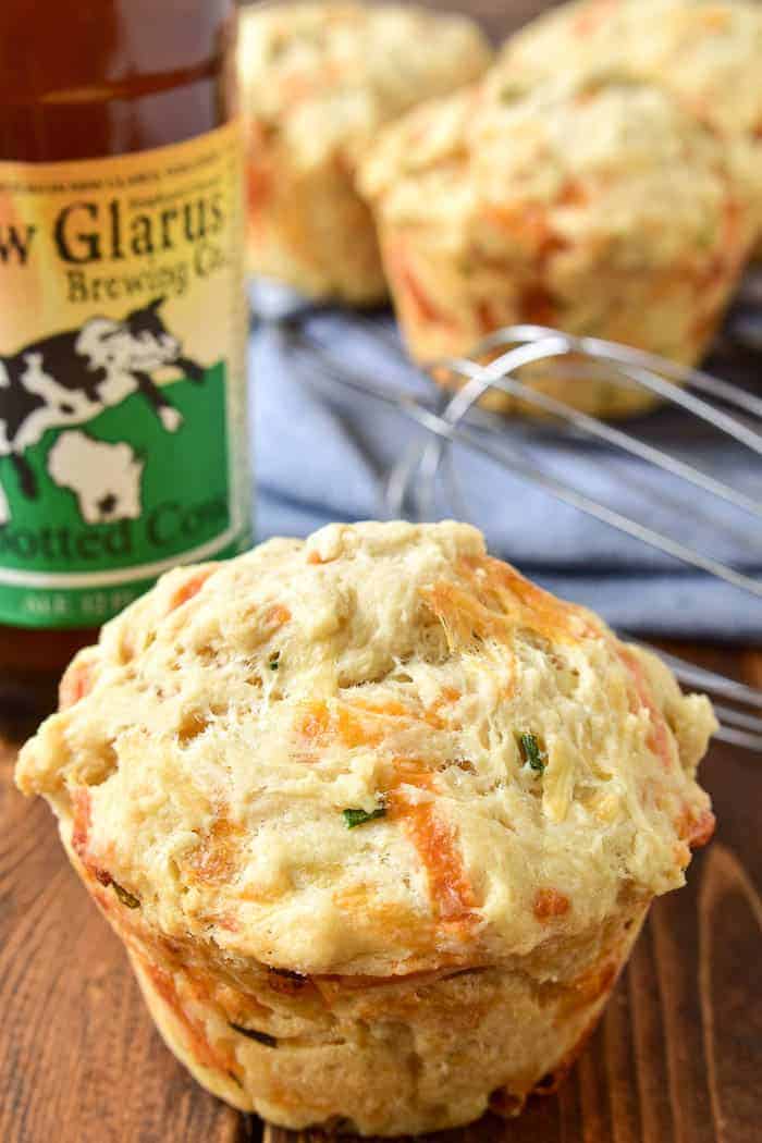 Take Beer Bread to the next level with these delicious Beer Cheese Muffins! Made with just eight simple ingredients, these muffins are incredibly easy to make and are the perfect addition to any meal. Enjoy them with a bowl of soup, a salad, or all on their own. If you love beer bread, you'll fall in love with these perfectly crusty, perfectly delicious Beer Cheese Muffins!