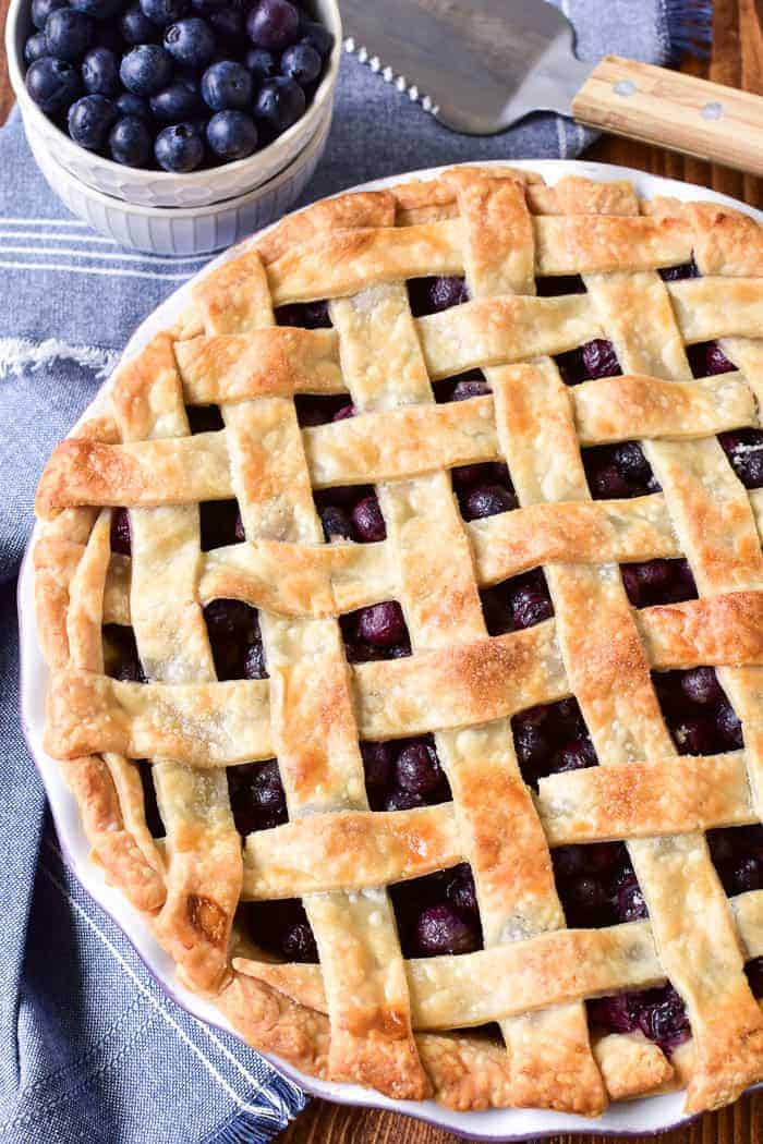 This Easy Blueberry Pie is one of our favorite summer desserts! It's simple to make, with just a handful of ingredients, and packed with the sweet taste of fresh blueberries. This pie is perfect for summer picnics or parties, and it comes together in no time at all. You can serve it as is, straight from the pan, or with a scoop of vanilla ice cream for a summer treat that's sure to be a hit!