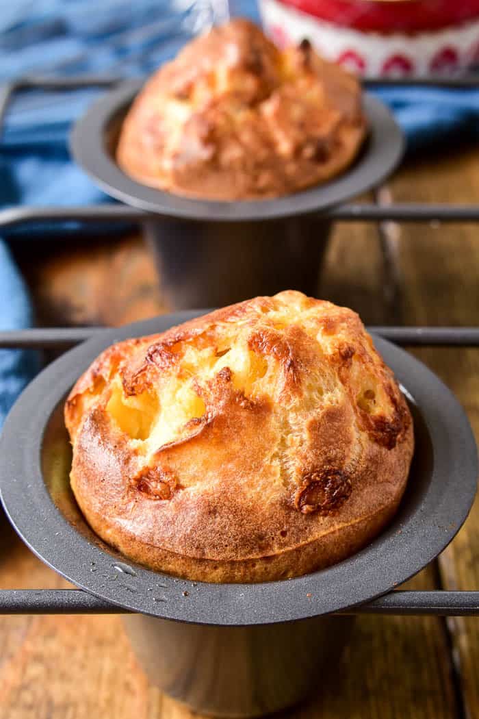 Take your dinner rolls to the next level with these Bacon Cheddar Popovers! They're just like traditional popovers - light, airy, and crispy around the edges - with the delicious addition of bacon and cheddar cheese. These popovers are the perfect side dish for any meal and can even double as breakfast. And best of all, they're so easy to make. Just 6 ingredients and 5 minutes of prep is all it takes for these yummy bacon & cheese popovers - guaranteed to become a favorite!