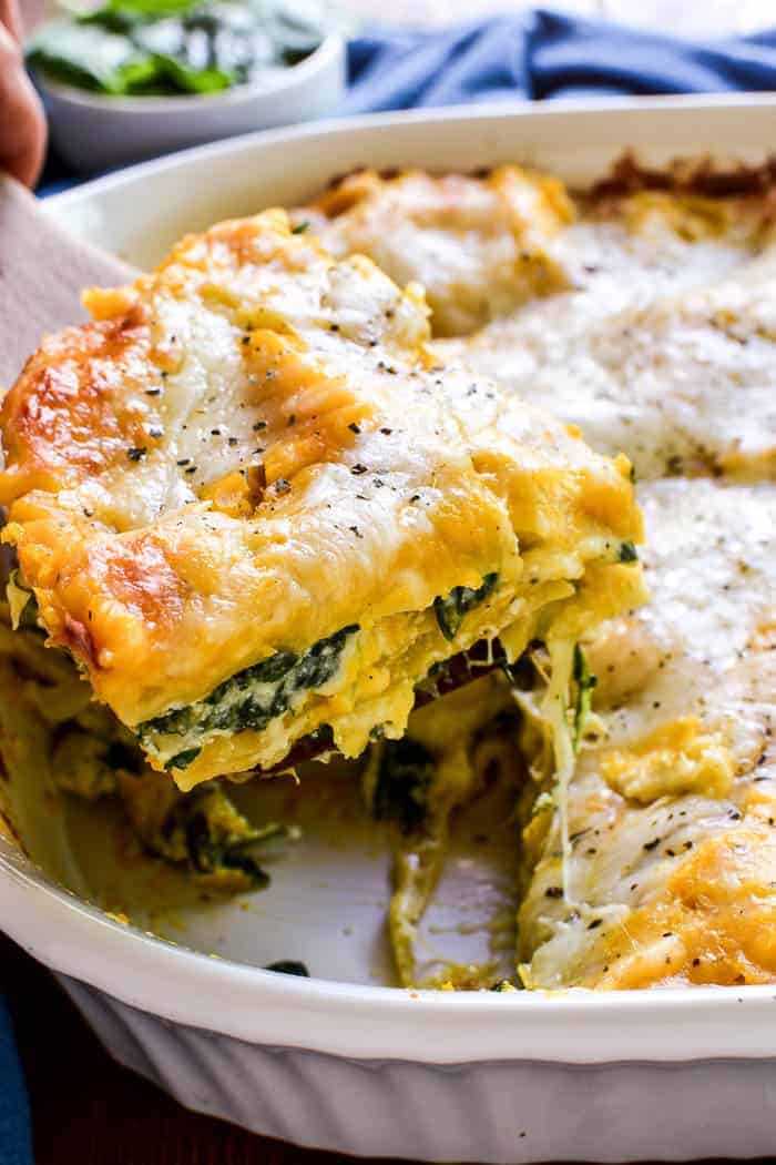 This Butternut Squash Lasagna is the ultimate fall comfort food. It combines layers of creamy ricotta, butternut squash, fresh spinach, and gooey mozzarella in a cheesy lasagna that everyone is sure to love. This dish is easy to make ahead and perfect for busy weeknights or weekend family meals. And it would make a delicious addition to any holiday menu!
