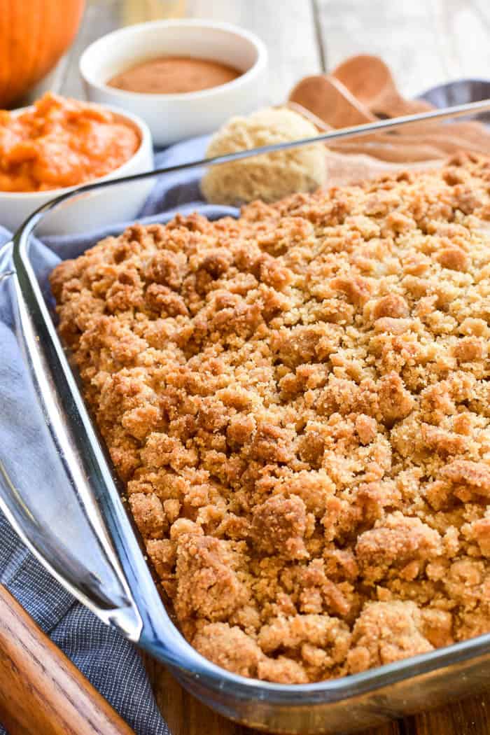 Pumpkin Coffee Cake with cinnamon streusel topping is the ultimate taste of fall! This coffee cake is packed with delicious pumpkin flavor and topped with a crunchy, buttery streusel topping. Perfect for holiday brunches or a special fall treat, if you love all things pumpkin, this Pumpkin Streusel Coffee Cake is sure to become a new favorite!