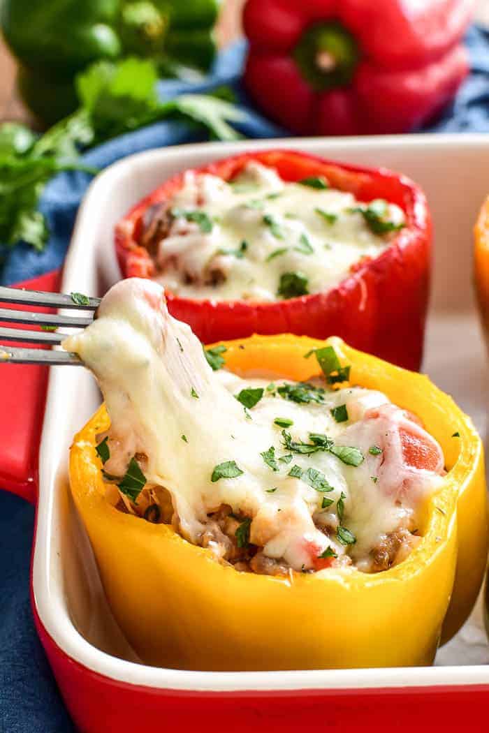 Italian Stuffed Peppers with melted cheese pull