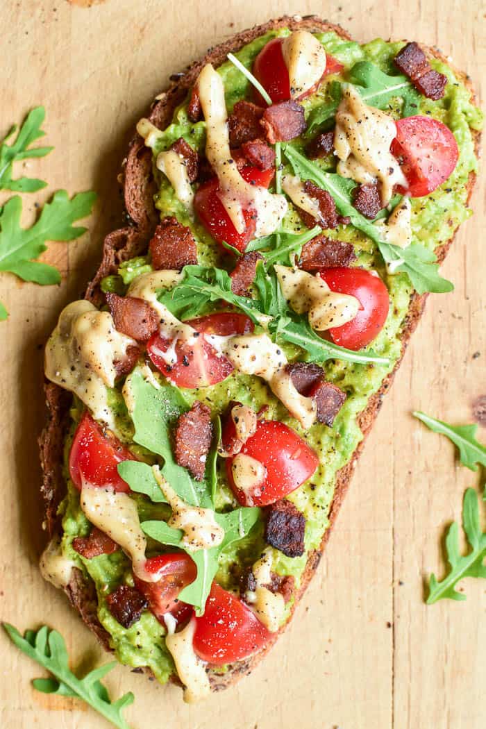 Close-up of BLT Avocado Toast on cutting board