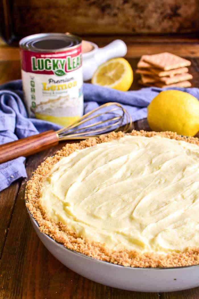 Lemon Pie Cheesecake Dip with ingredients in the background
