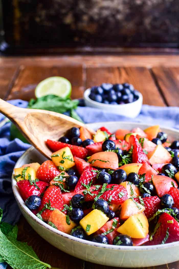 Mojito Fruit Salad with serving spoon