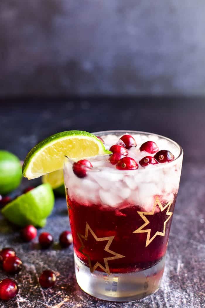 Vodka Cranberry with lime wedge and fresh cranberries