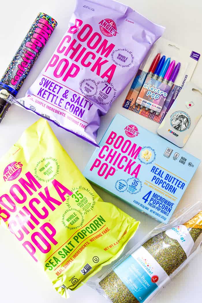 Popcorn Gift Basket supplies including Angie's Boomchickapop Popcorn, Electro Pop Sharpies, Pop Socket, and confetti poppers