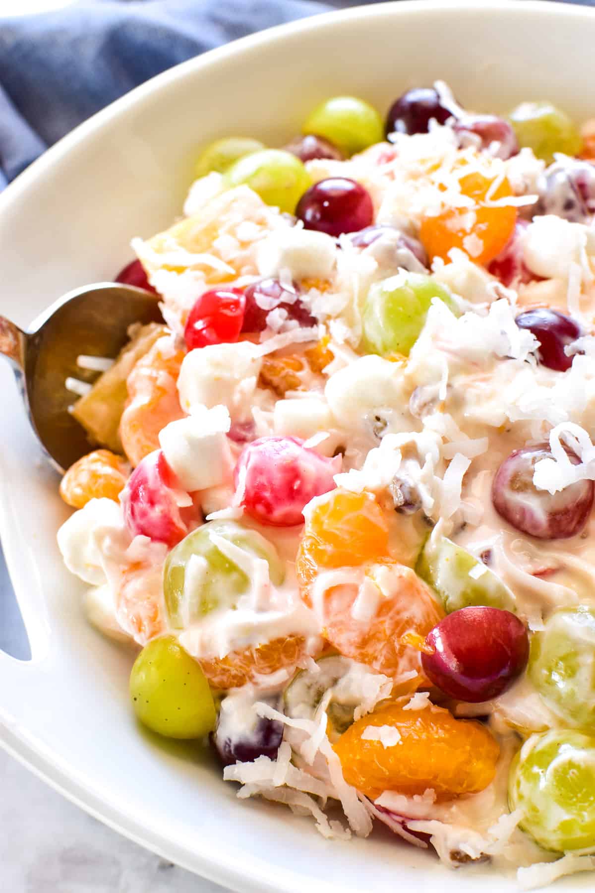 Ambrosia Salad in serving bowl with spoon