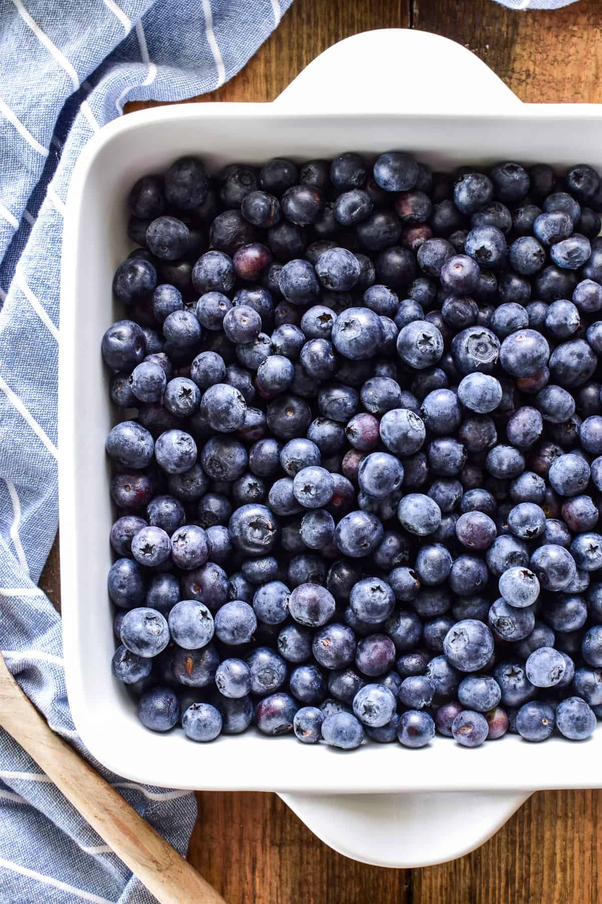 Fresh blueberries in square white pan