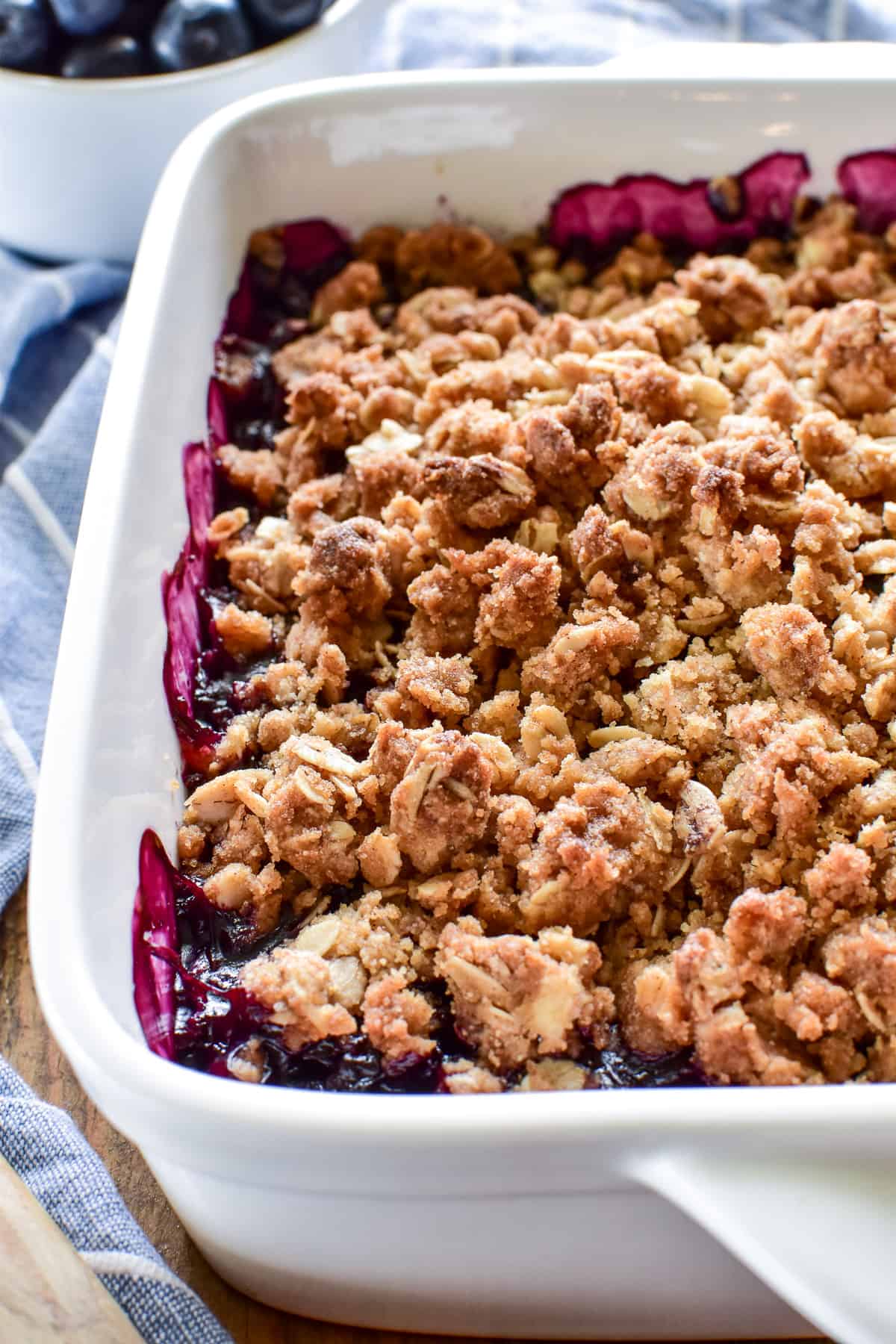 Close up of Blueberry Crisp in white pan
