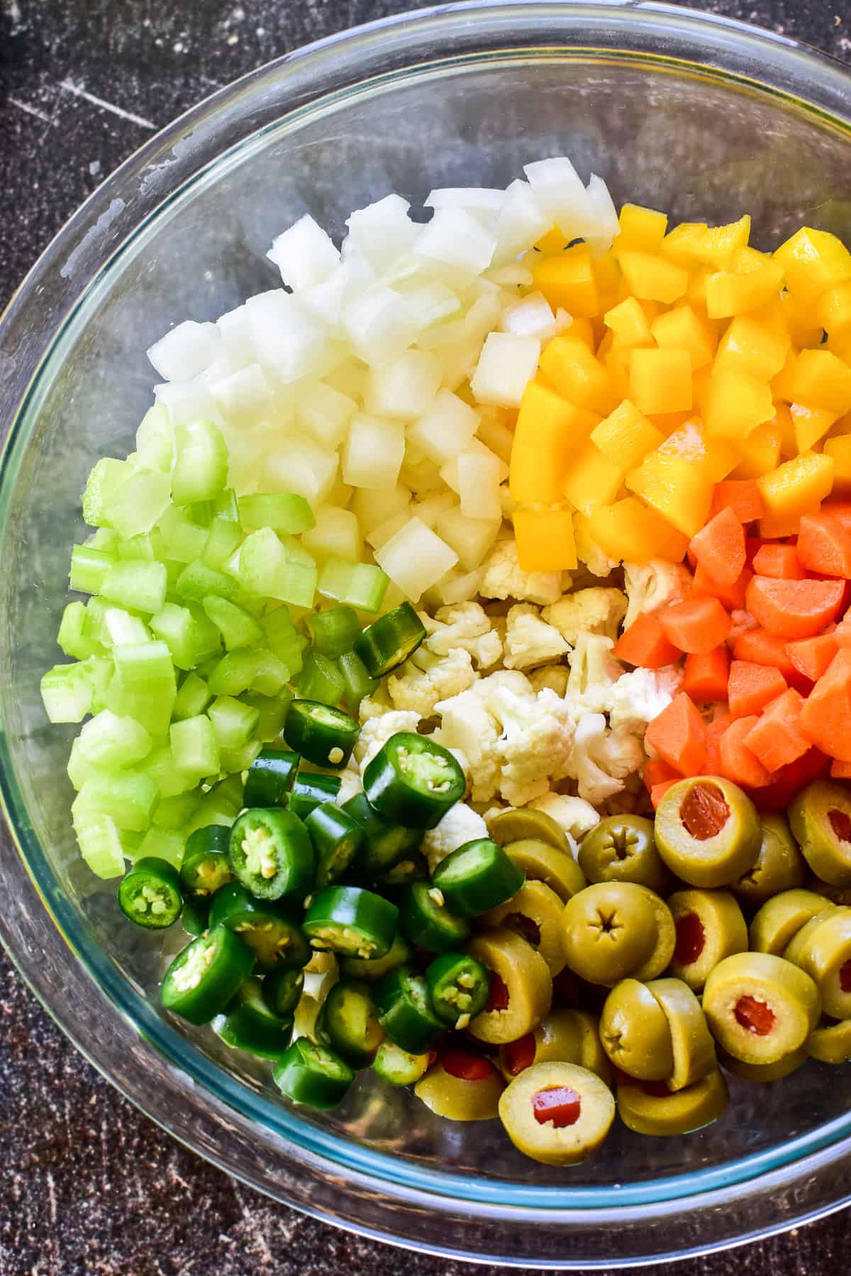 Chopped veggies in glass bowl