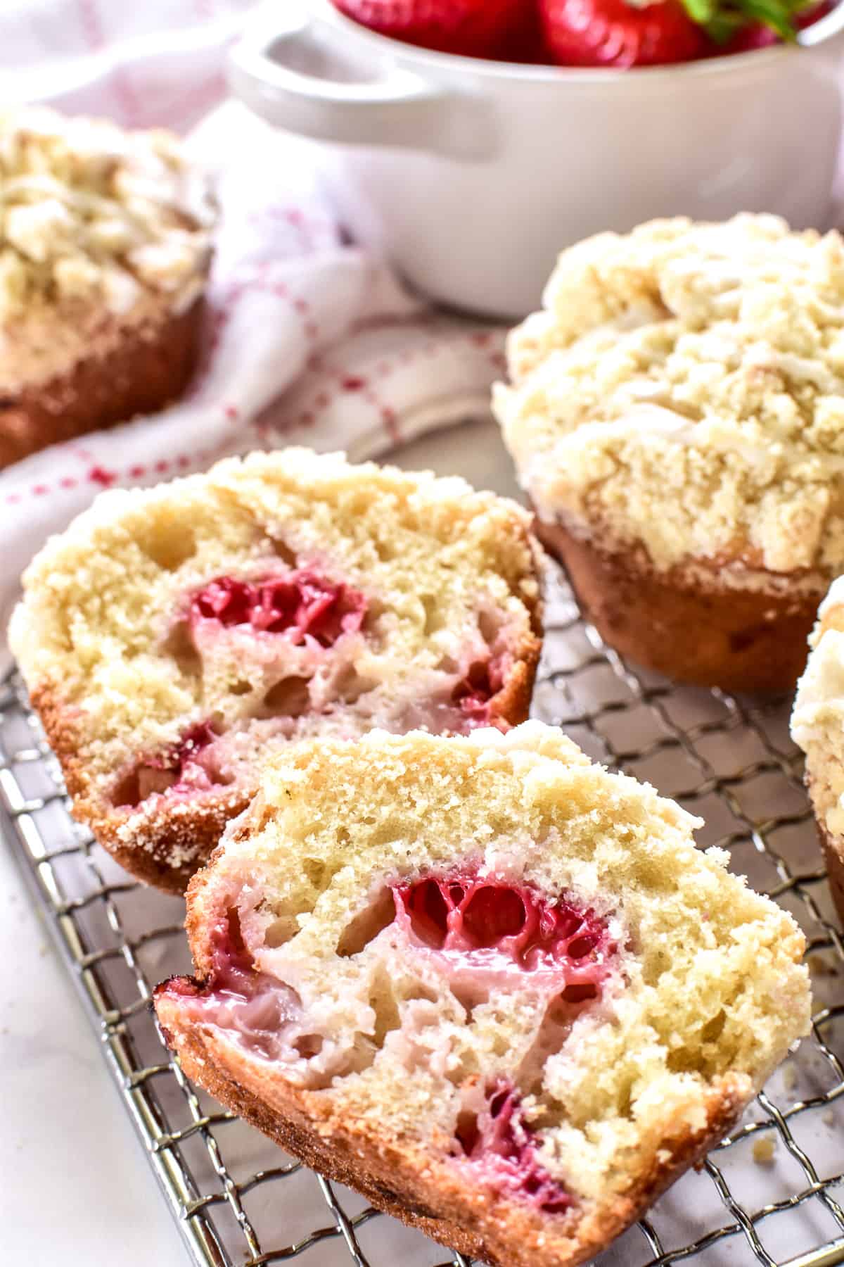 Strawberry Muffin cut in half with strawberries inside